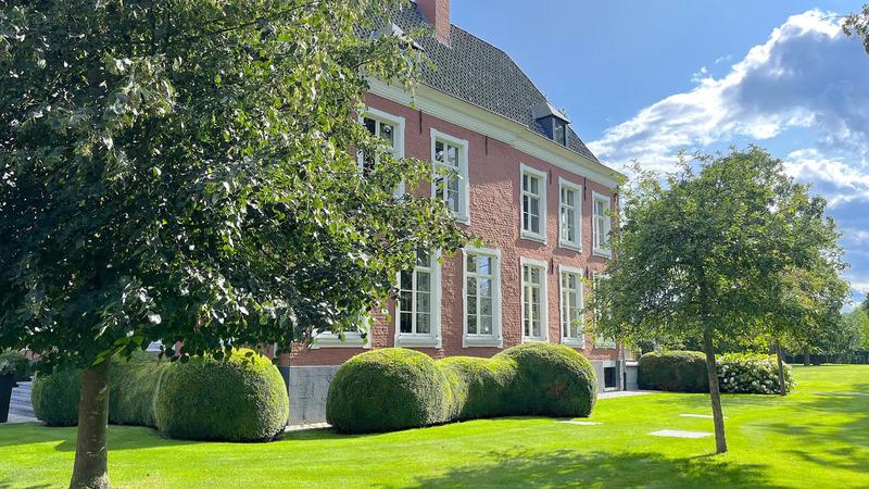 Historic château villa in the Knokke countryside, surrounded by lush greenery